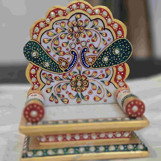 Decorative item with intricate patterns on a plain background